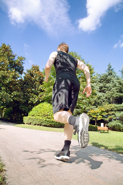 Man running in park - Foto, Imagen