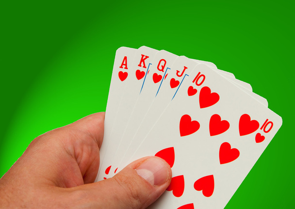 Todas as cartas na sua mão no casino
 - Foto, Imagem
