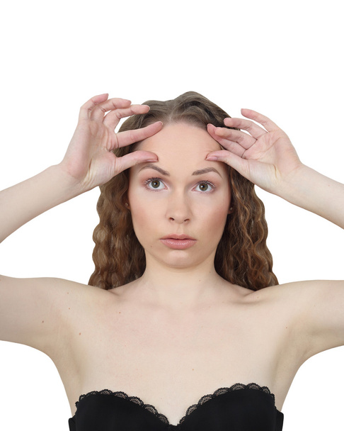 Jeune femme fait massage facial
 - Photo, image