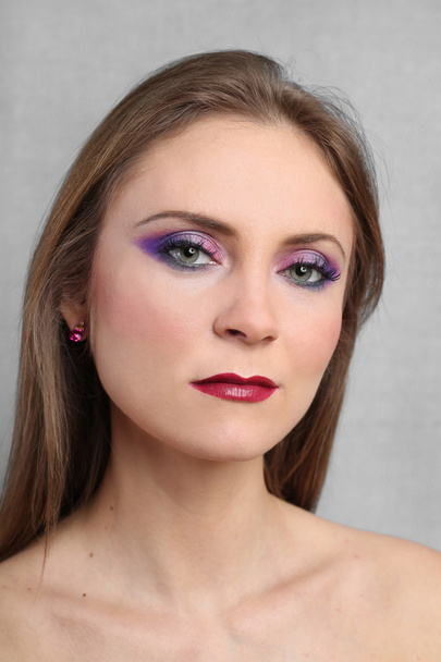 Pretty young woman with bright evening makeup - Φωτογραφία, εικόνα
