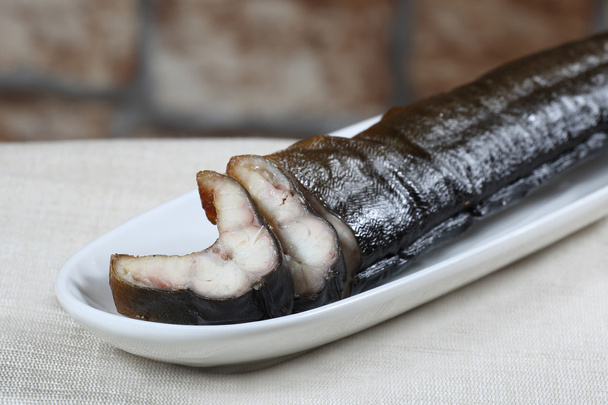 Smoked eel on table - Photo, Image