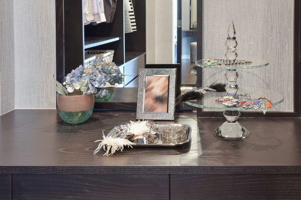 female accessories on wooden dressing table at home - Foto, Imagem