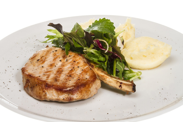 Grilled pork with salad and potato - Photo, Image