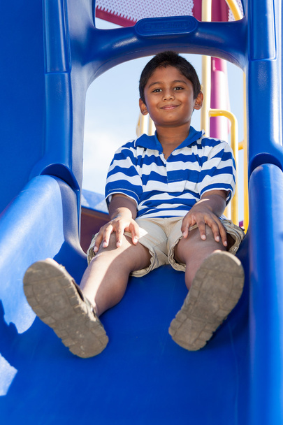 Portrait of a cute little indian boy at playground - 写真・画像