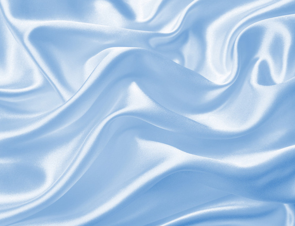 Smooth elegant blue silk or satin texture as background - Фото, зображення