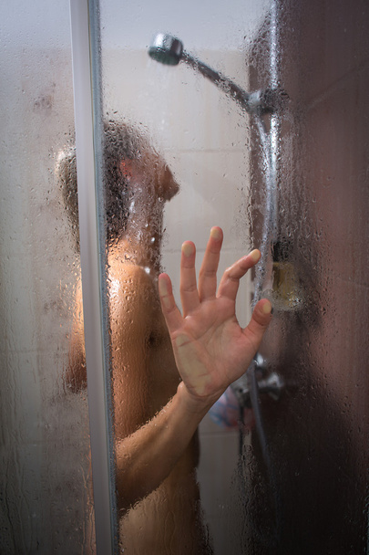 Young woman taking a hot long shower  - Photo, image