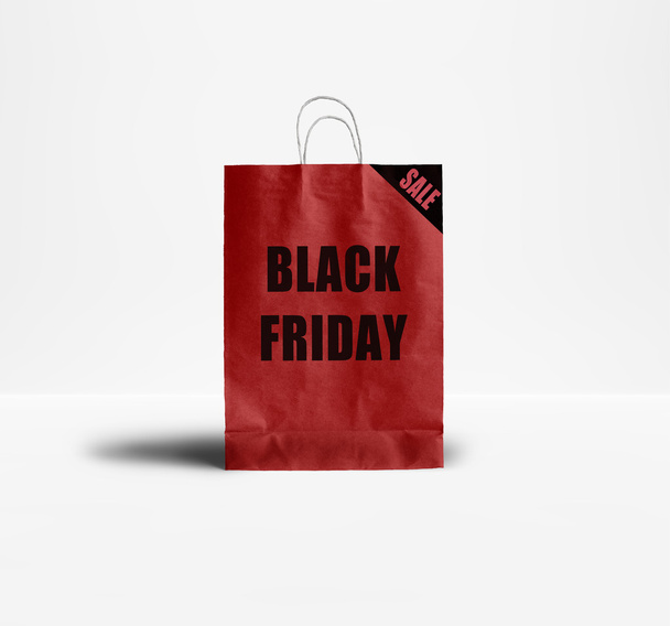 Black Friday paper bag. Promotional concept. - Φωτογραφία, εικόνα