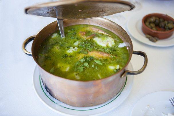 Arroz de Tamboril or soupy seafood rice, portuguese recipe - 写真・画像