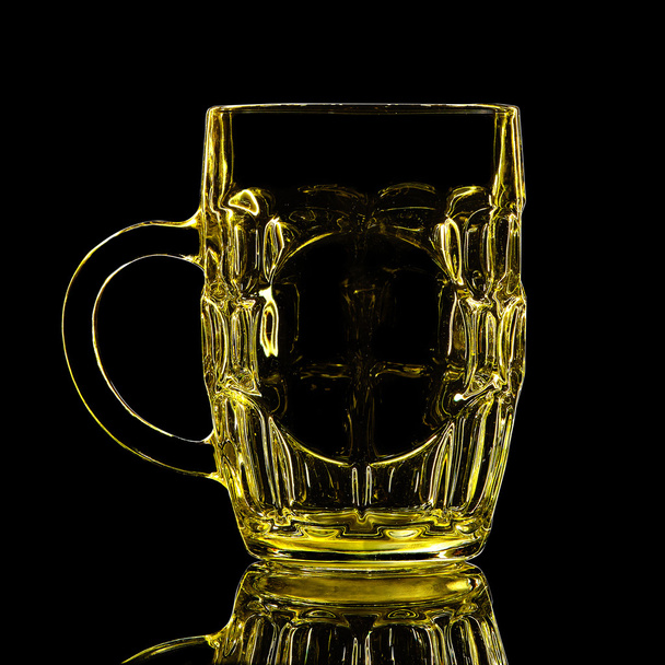 Silhouette of beer glass on black background - Фото, изображение