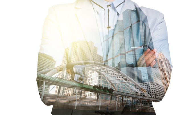 Double Exposure of Businessman and Business building City at Sun - Photo, Image