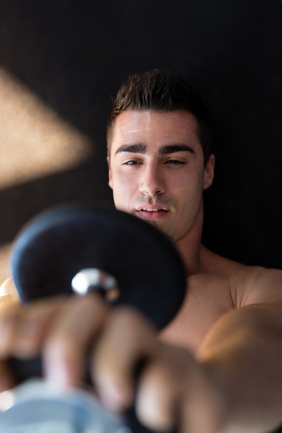 Strong man at gym - Foto, Imagen