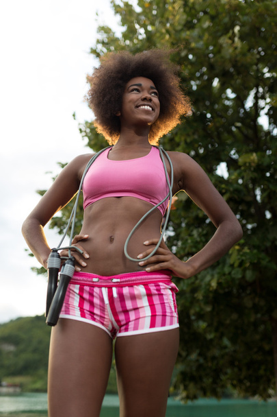 modern woman with jump rope - Фото, зображення