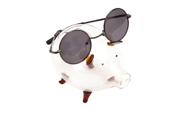Glass piggy bank with sunglasses - Photo, Image