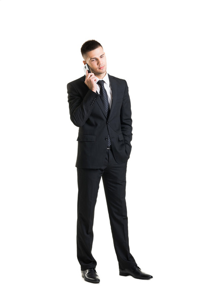 Young and confident businessman in black suit - Foto, imagen
