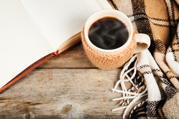 Hot drink in a large cup, book, plaid - Photo, Image