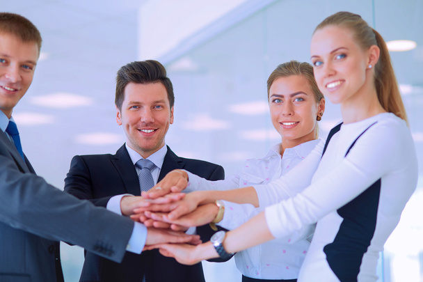 Business people with their hands together in a circle - Photo, Image