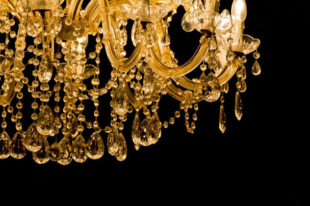 Luxury chandelier with light candles and right dark background - Photo, Image