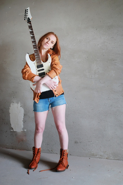 girl with electric guitar rock - Photo, Image