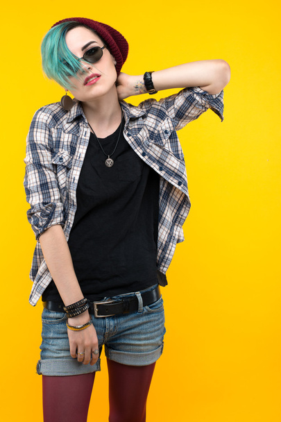creative person style on yellow background. modern teenager. colour / colorful hairstyle - Фото, изображение