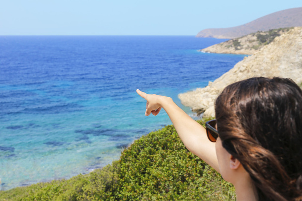 Woman pointing to the Mediterranean - Φωτογραφία, εικόνα