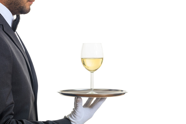Waiter serving wine on a tray - Photo, Image