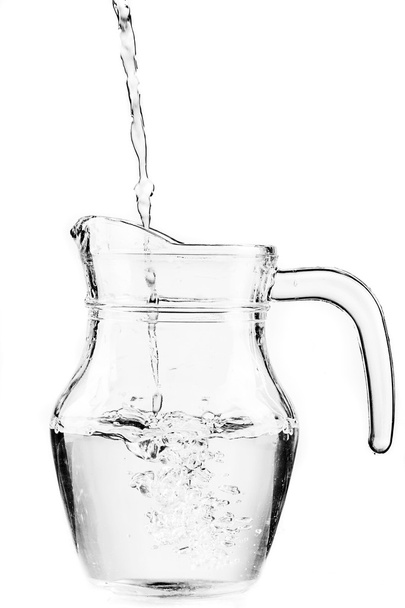 Fresh water in a glass pitcher - Фото, изображение