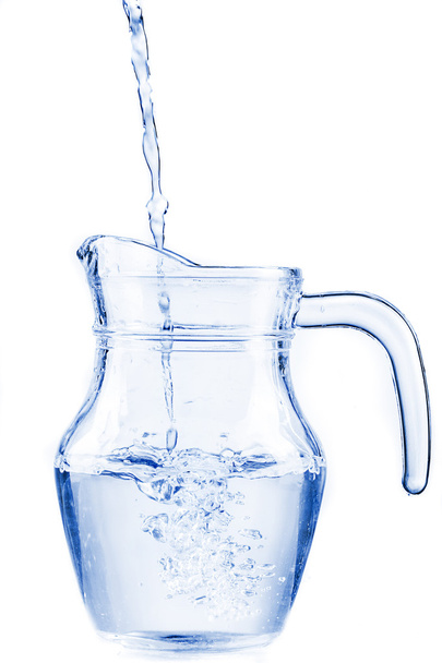 Fresh water in a glass pitcher - Foto, afbeelding