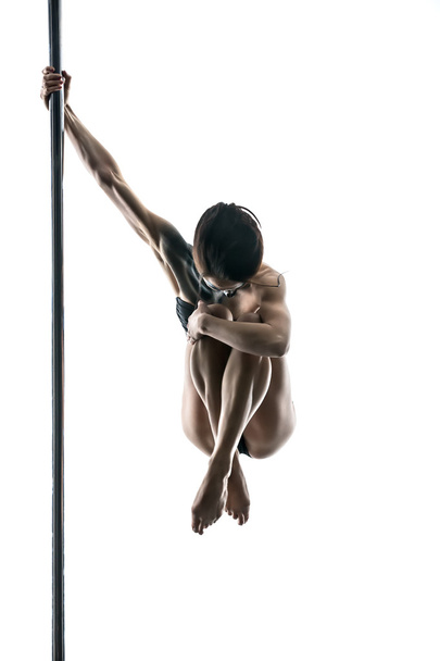 Female pole dancer with body-art on pylon - Fotografie, Obrázek