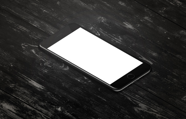 Moderni matkapuhelin mustalla pöydällä. Isometrinen, sivuasento
 - Valokuva, kuva