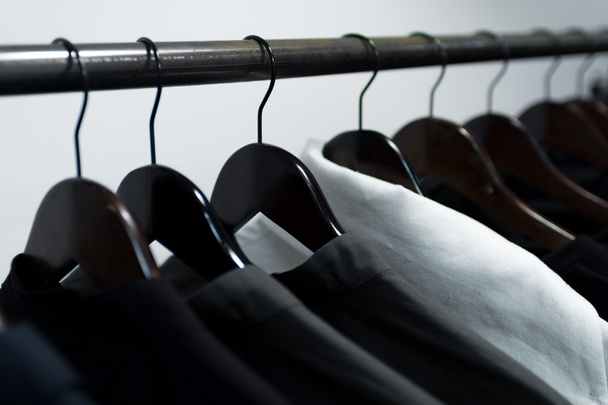 Clothes on hangers in store - Photo, Image