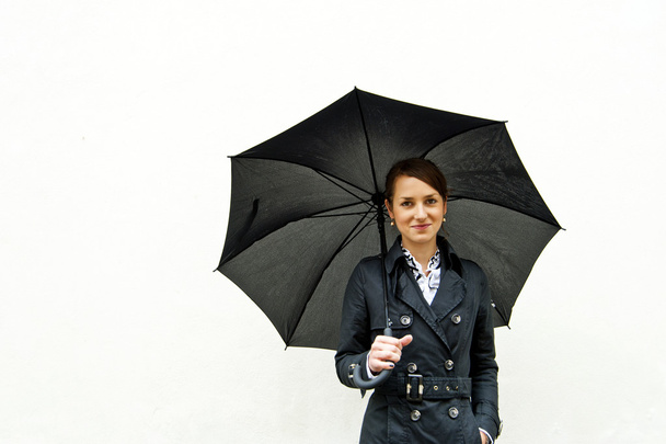 Donna sotto l'ombrello
 - Foto, immagini