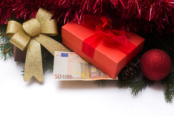Christmas Gift box  with Euro money on white background - Foto, immagini