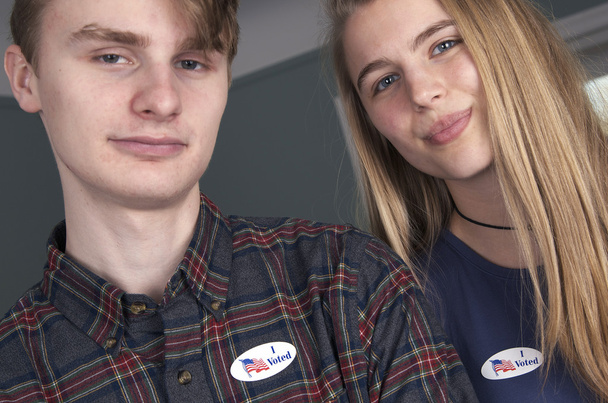 First Time Voters, Young Guy and Girl - 写真・画像