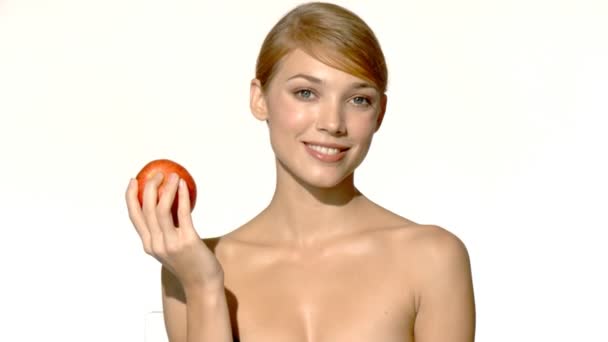 Retrato de mulher bonita e sexy, segurando maçã
 - Filmagem, Vídeo