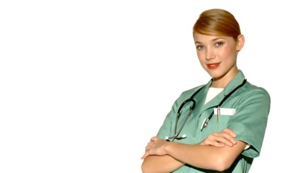 20-25 Jahre alte schöne Ärztin isoliert auf weiß - Filmmaterial, Video