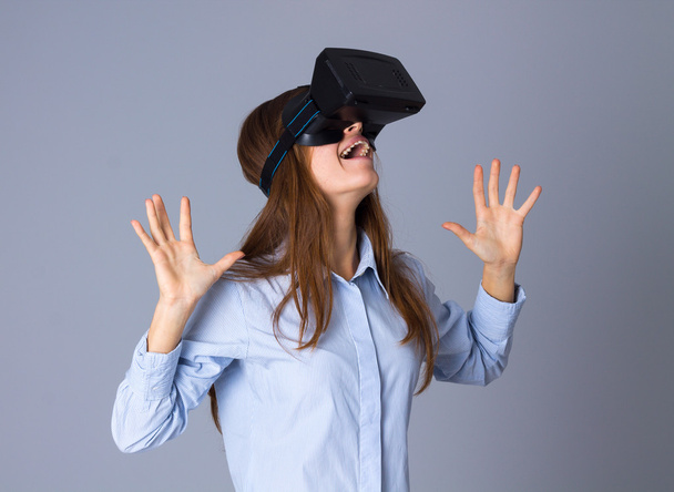 Woman using VR glasses - Photo, Image