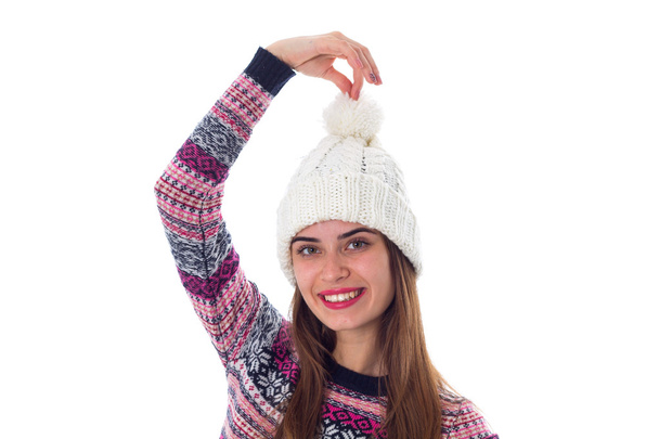 Woman in sweater and white hat holding a bubo - Photo, Image