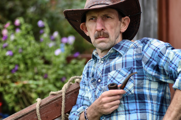 cowboy homem fumaça cachimbo
 - Foto, Imagem