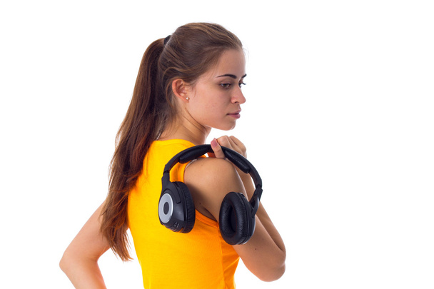 Young woman in headphones - Foto, afbeelding