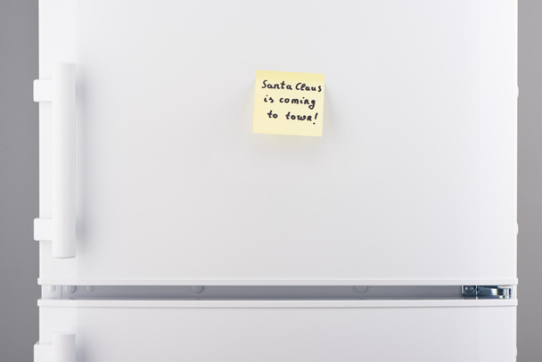 Santa Clouse is coming to town note on white refrigerator  - 写真・画像