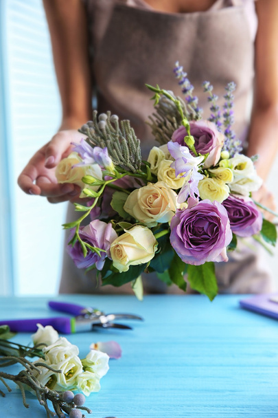 florist with beautiful bouquet  - Foto, Imagem