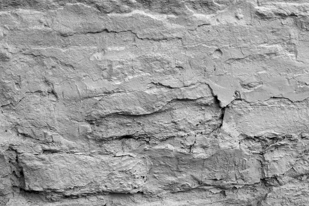 Het patroon, achtergrond. een muur bekleed met steen, witgekalkte - Foto, afbeelding