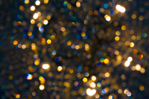 Bitmappatroon, patroon, achtergrond. lichte kristallen kroonluchter met onscherpe focus - Foto, afbeelding