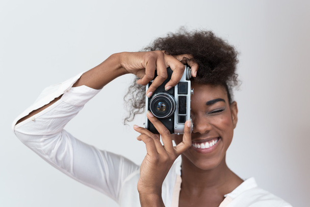 Afro american woman with vintage camera - Fotó, kép