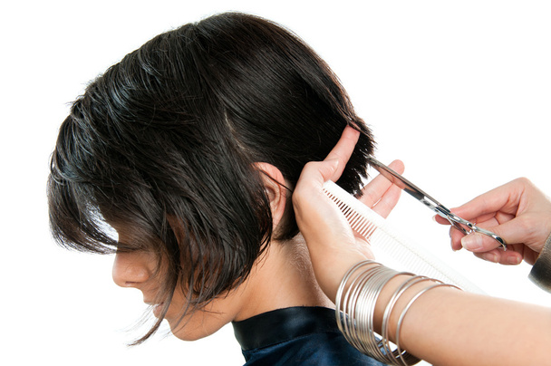 Hairdresser cutting hair - 写真・画像