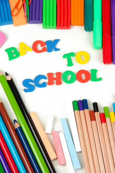 The words 'Back to School' composed of letters with various school supplies - Foto, Bild