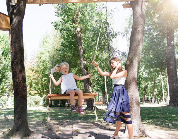 mother and daughter in park - Photo, image