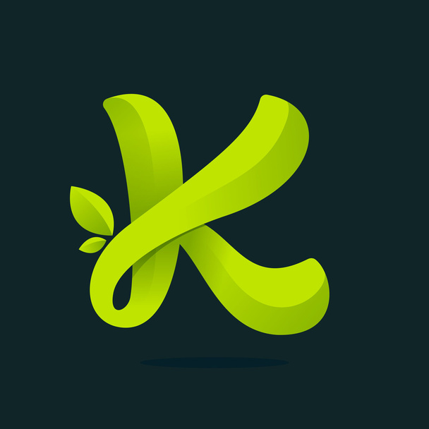 K letter logo with green leaves. - Vector, Image