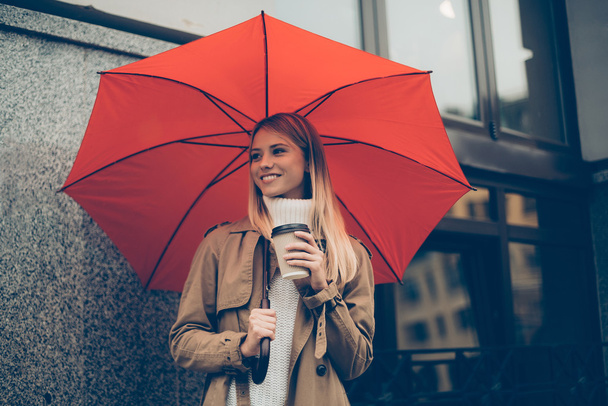 beautiful young woman with umbrella - Фото, зображення