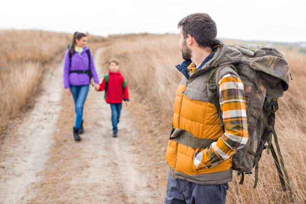 Man with wife and son backpacking - Photo, Image